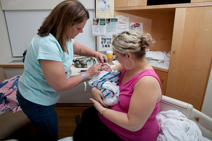 Mother Michele Teller gave birth to Baby Olivia Roy on 8/26/2012 at 11 pm, the night before the photo was taken. Teller's mother, Lesie Vargas, is pictured in the first image.