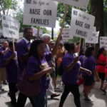 BROWN UNIVERSITY dining service employees were among the marchers in a Labor Day rally put on by the Service Employees International Union Local 615 that started at the school's College Hill campus and proceeded down to the city's Financial District. / COURTESY SEIU LOCAL 615
