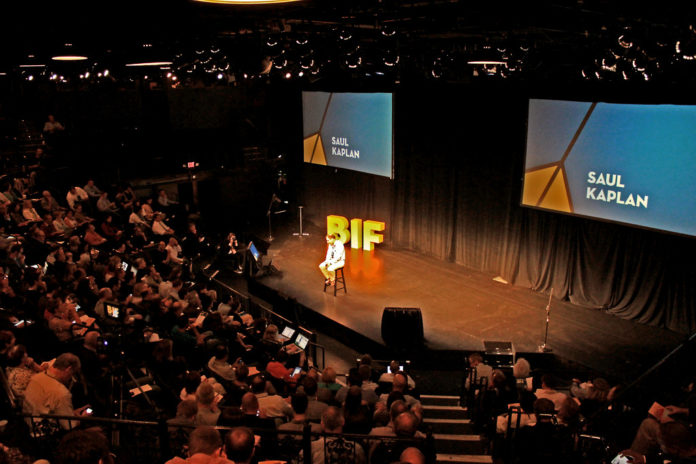 BUSINESS INNOVATION FACTORY'S Saul Kaplan kicked off the BIF-8 Summit to a sold-out crowd on Wednesday at Trinity Repertory Company. / PBN PHOTO/EMILY GREENHALGH