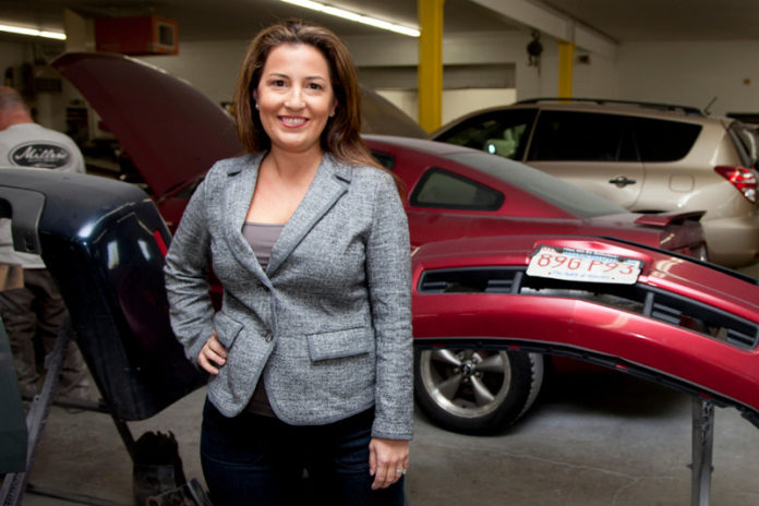 STEPPING IN: Candace Simas, owner of Miller’s Auto Body, took control of the 30-year-old shop in 2010 following a family crisis. She’s been behind the wheel ever since. / PBN PHOTO/NATALJA KENT