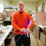 BONE STRUCTURE: IlluminOss President and CEO Scott Rader shows off the company&rsquo;s photodynamic bone-stabilization system. He says the new round of financing will help the clinical trials that will hopefully lead to the firm&rsquo;s FDA approval. / PBN PHOTO/RUPERT WHITELEY