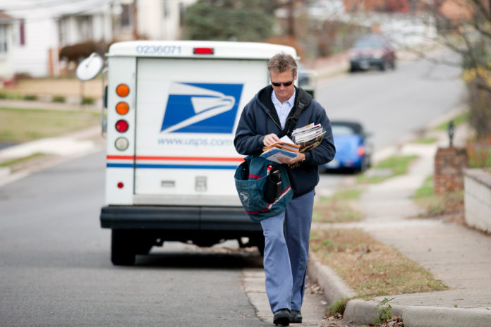 DURING 2012, the U.S. Postal Service's net loss widened to $15.9 billion. / BLOOMBERG FILE PHOTO/ANDREW HARRER DURING 2012, the U.S. Postal Service's net loss widened to $15.9 billion. / BLOOMBERG FILE PHOTO/ANDREW HARRER
