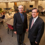 TECH SUPPORT: Donald R. Bailey, left, director of Phillips Memorial Library at Providence College, and John Sweeney, senior vice president and chief financial officer at PC, in the library&rsquo;s TecHub. / PBN PHOTO/DAVID LEVESQUE