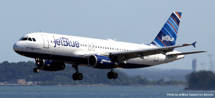 JETBLUE AIRWAYS CORP. will begin its service out of Rhode Island today with a celebration including Gov. Lincoln D. Chafee, the New England Patriots Cheerleaders and JetBlue executives, among others. / COURTESY JETBLUE AIRWAYS/IAN DUNCAN