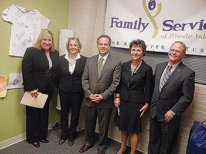 FAMILY SERVICE OF RHODE ISLAND recently accepted $50,000 to improve child trauma treatment for children throughout the state. Pictured from left to right are Margaret Holland McDuff, CEO of Family Service of Rhode Island; Dr. Susan Erstling, who heads the Family Service of Rhode Island child trauma center; U.S. Rep. David N. Cicilline; Janice DeFrances, director of the R.I. DCYF and Francis Paranzino, vice president/chief operating officer of Newport County Community Mental Health Center.