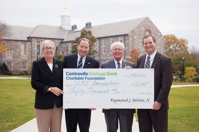 CENTERVILLE BANK recently contributed $50,000 toward student scholarships at the University of Rhode Island. Pictured from left are Katharine H. Flynn, director, corporate and foundation relations, of the URI Foundation; David M. Dooley, president of URI; Raymond J. Bolster II, Centreville Bank president and CEO; and Michael J. Smith, president of the URI Foundation.