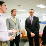 Soft-skill investments create technology-service ROI MAKING CONNECTIONS: Atrion Networking CEO Tim Hebert, above wearing glasses, understands that investing in his staff increases the company’s success. With him at Atrion’s Warwick headquarters are, from left, Anthony Kinney, Daniel Muncey and Kathryn George. / PBN PHOTO/RUPERT WHITELEY