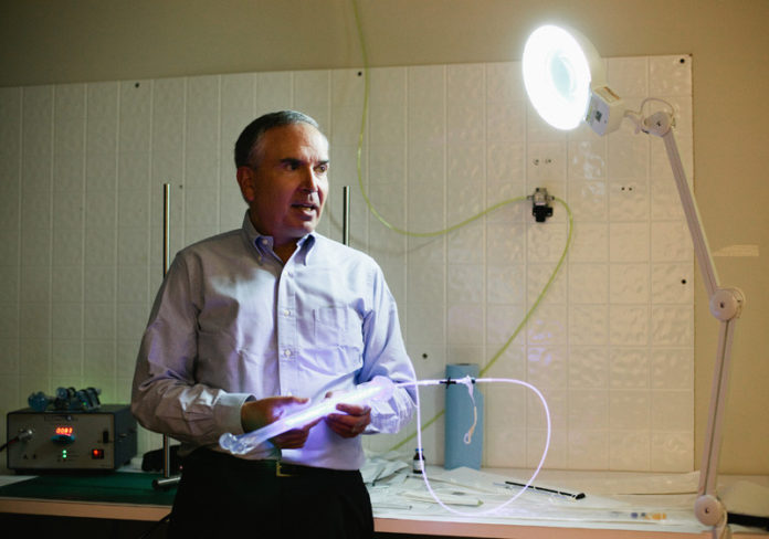 LIGHTING ON A SOLUTION: Thanks to $50 million in investment capital, IlluminOss Medical founder Robert Rabiner has been able to take his idea for repairing bones through European clinical trials and to the verge of U.S. trials. / PBN PHOTO/RUPERT WHITELEY