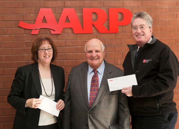 THE AARP FOUNDATION recently contributed to organizations assisting with emergency relief efforts. Pictured are Janice Pothier Pac, associate director of Serve Rhode Island, Anthony Regine, AARP state president and John Luby, Salvation Army Rhode Island state coordinator. / COURTESY AARP/JOHN MARTIN