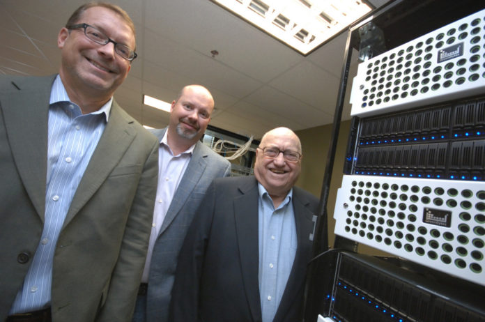 FROM THE LEFT, Richard Petrocelli (founder and director), Robert Petrocelli, (founder and chief technology officer) and Americo Petrocelli (director) of GreenBytes Inc. GreenBytes has announced the relocation of its corporate headquarters from Hopkinton to downtown Providence.  / PBN FILE PHOTO/BRIAN MCDONALD