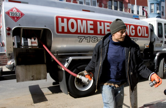 HEATING OIL GAINED on colder-than-normal weather forecasts for the Northeast. / BLOOMBERG FILE PHOTO/ANDREW HARRER