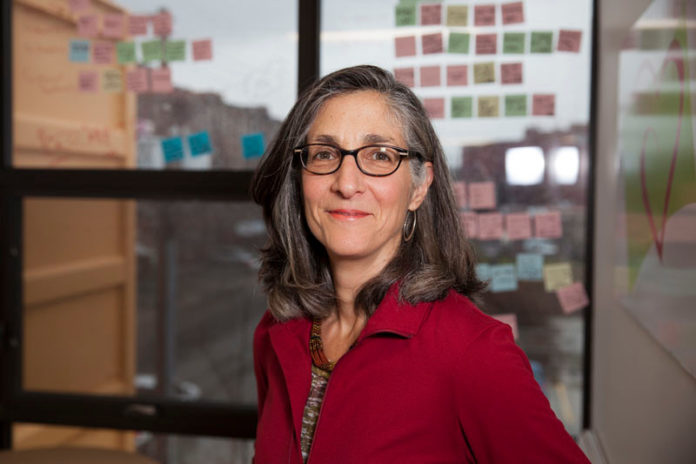 SELLING BONDS: Diane Lynch, member of the Social Venture Partners Rhode Island board, says that Rhode Island’s size makes it easy to get “everyone in the room to sit down and talk.” / PBN PHOTO/DAVID LEVESQUE