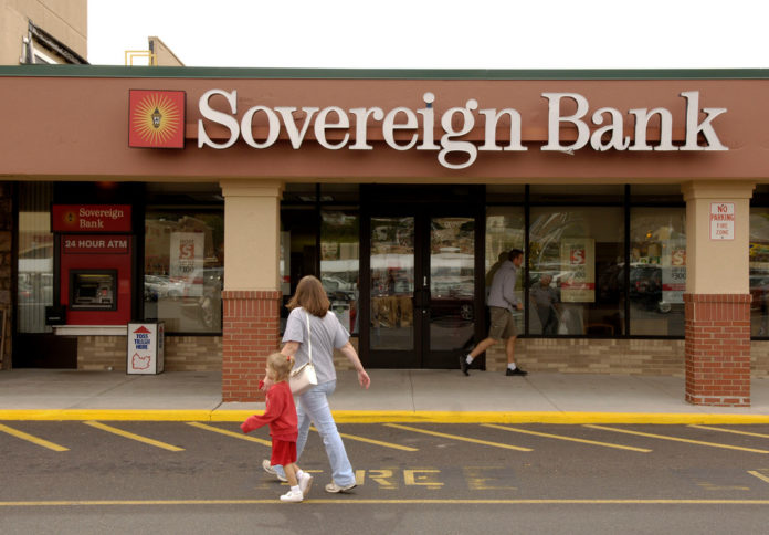 THE LATEST IN A STRING of customer fee increases from local and national banks, Sovereign Bank has doubled the monthly cost of its basic checking account, raised its minimum balance requirement and added a $2 surcharge for checking a balance at another bank's ATM. / BLOOMBERG FILE PHOTO/MIKE MERGEN