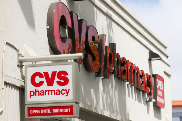 CVS Caremark Corp. posted fourth-quarter profit of $1.13 billion, or 90 cents per diluted share, and full-year profit of $3.88 billion, or $3.03 per diluted share.  / BLOOMBERG FILE PHOTO/DAVID PAUL MORRIS