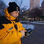 SMART system getting small problems fixed fast SMARTER APPROACH: Donald Perez, Providence Downtown Improvement District safety team leader, uses the SMART system in Kennedy Plaza. / PBN PHOTO/DAVID LEVESQUE