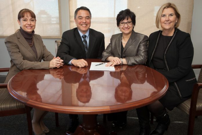 FROM LEFT: Meryl Moss, COO of Coastal Medical; Dr. G. Alan Kurose, president and CEO of Coastal Medical;  Diana Franchitto, president and CEO of Home & Hospice Care of Rhode Island; and Donna M. Gouveia, CPA, president and CEO of Visiting Nurse Home Care, at the signing of the new preferred providers agreement. / COURTESY HOME & HOSPICE CARE OF RHODE ISLAND/SCOTT KINGSLEY