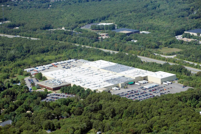 STEEP FALL: The West Warwick warehouse purchased by Brookwood Financial last year for $10 million, or $11.5 million less than it sold for in 2007. / COURTESY CBRE NEW ENGLAND
