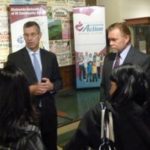NED HANDY, President of Citizens Bank and RBS Citizens Rhode Island, left, and Tony Maione, president of United Way of Rhode Island, speak with guests at the press conference on the Earned Income Tax Credit press conference at the Museum of Work and Culture in Woonsocket in January.
