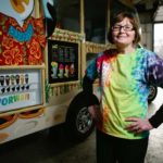 Thousands take leap into ownership FROZEN ASSETS: Joyce Bouchard next to her Kona Ice truck. She and her husband launched a business selling shaved ice last summer. / PBN PHOTO/RUPERT WHITELEY