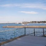VISUAL EFFECTS: In this simulated view of Coaster's Harbor Island from Cypress Street in Newport, two turbines are visible in the upper right. / COURTESY NAVAL STATION NEWPORT