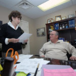 LEAVE IT TO THE PROS: Jane Casey, president of Professional Security Services, speaks with Louis Ranieri, the company&rsquo;s executive vice president and director of security. / PBN PHOTO/BRIAN MCDONALD