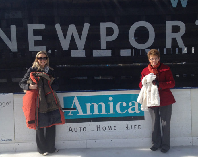 MORE THAN 200 coats were donated to The Amica Insurance Coat Drive, held Dec. 7 through Jan. 27 at the Newport Skating Center. Pictured are Meggan Ayres, left, who works in sponsorships at Amica, with Marilyn Warren, executive director of the Dr. Martin Luther King Jr. Community Center.