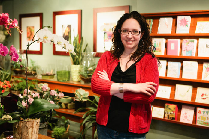 IN BLOOM: Christina Chandler, a partner at Studio 539 on Wickenden Street, said her business has handled several same-sex marriages in Massachusetts. / PBN PHOTO/RUPERT WHITELEY
