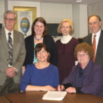 Women’s Center, Crossroads form partnership THE WOMEN'S CENTER OF Rhode Island and Crossroads Rhode Island have signed an affiliation agreement to help address the connection between domestic violence and homelessness. (Standing, from left: Chris Woulfe, Kris Lyons, Vera Gierke, Scot Jones. Sitting, from left: Virginia Branch, Anne Nolan) / COURTESY CROSSROADS RHODE ISLAND/WOMEN'S CENTER OF RHODE ISLAND