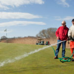 Brown a color of choice on fairways JOIN THE CLUB: Sakonnet Golf Club in Little Compton is one of five golf courses in Rhode Island to be certified under a new DEM program. Pictured above are course Superintendent Kirk Whiting, left, and his assistant, Matt Barratt. / PBN PHOTO/RUPERT WHITELEY