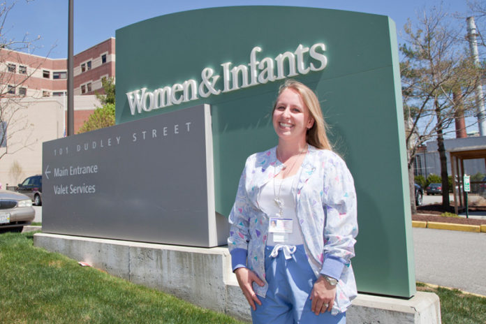 A DAY'S WORK: Kristen Snow is a per-diem nurse at Women & Infants Hospital. She 
regularly logs 60-hour workweeks, but lacks benefits, including paid leave. / PBN PHOTO/NATALJA KENT