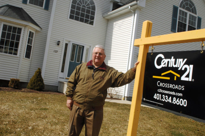SUPPLY AND DEMAND: Robert Martin of Century 21 CrossRoads shows off a Cumberland house. He says demand has increased, but bidding wars are uncommon. / PBN PHOTO/BRIAN MCDONALD