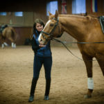 HORSE POWER: Crystal Taylor, director of riding, assistant professor, and dressage team coach, conducts a class at the Johnson & Wales Equestrian Center. / PBN PHOTO/ STEPHANIE ALVAREZ EWENS