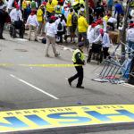 BOSTON POLICE CORDON off the finish line area where two explosions occurred along the final stretch of the Boston Marathon on Boylston Street in Boston, Massachusetts, U.S., on Monday, April 15. Two powerful explosions rocked the finish line area of the Boston Marathon near Copley Square and police said many people were injured. / BLOOMBER PHOTO/KELVIN MA
