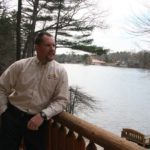Lakefront living only way for some HOLDING WATER: Scott Freerksen, owner of Lakefront Living Realty, in front of his lakeside home in Mansfield. The lakefront market is stable even during economic downturns, he says. / PBN PHOTO/MICHAEL PERSSON