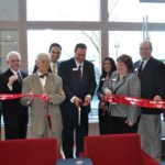 BofA gives to United Way A GROUP shot of Bank of America employees officially opening the new banking center.
