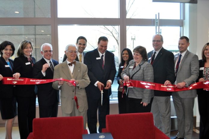 A GROUP shot of Bank of America employees officially opening the new banking center.