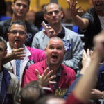 STOCK FUTURES were little changed in the U.S. Wednesday morning after the Dow Jones Industrial Average climbed above 15,000 for the first time ever Tuesday. / BLOOMBERG FILE PHOTO/TIM BOYLE