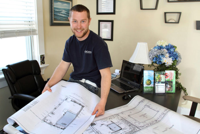 SURVEYING THE LANDSCAPE: DeCastro Landscaping President Gairad DeCastro started mowing lawns when he was 15 and launched his own company at 17. Now 23, he owns an expanding firm with two affiliated franchises. / PBN PHOTO/KATE WHITNEY LUCEY