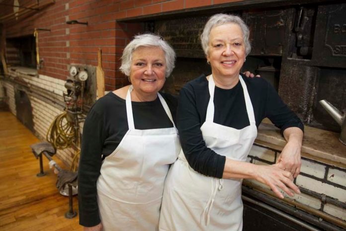 WHAT’S IN A NAME: There are no brothers at Scialo Bros. Bakery. The Federal Hill staple is owned by sisters Carol Scialo Gaeta, right, and Lois Scialo Ellis. / PBN PHOTO/DAVID LEVESQUE