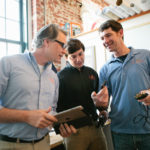 Smooth sailing for firm’s remote boat monitors SIREN SONG: Siren Marine employees, from left: Dan Harper, head of product development; Michael Moran, director of marketing and customer relations; and Vice President John McGarr. / PBN PHOTO/RUPERT WHITELEY