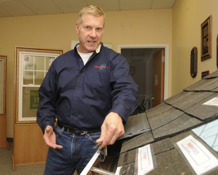 While new construction has yet to recover from the end of the real estate bubble, home improvement is thriving for companies like Woonsocket’s Moonworks that have the skills and reputation to attract new clients. President Jim Moon, pictured above, started the company in 1993 with a single product, gutter guards. He’s since grown the firm, which now employs 90, and its services. Moonworks also does roofs, installs replacement windows and, most recently, energy-efficiency retrofits. Gutters, however, are still the main product, accounting for roughly half of current sales. / PBN PHOTO/MARTIN GAVIN