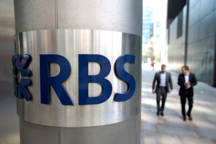 ROYAL BANK OF SCOTLAND GROUP PLC and Britain's three other large banks, will have eliminated roughly 189,000 jobs by the end of 2013, bringing staffing levels down to 2004 lows.  / BLOOMBERG FILE PHOTO/SIMON DAWSON