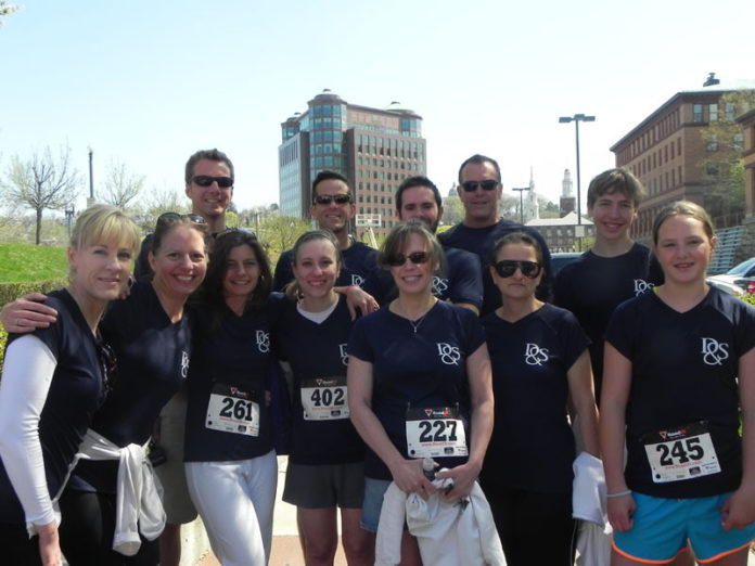 PROVIDENCE-BASED law firm Duffy & Sweeney contributed $1,000 to Amos House and showed its support for the organization by participating in a recent run/walk based on the running of the bulls.