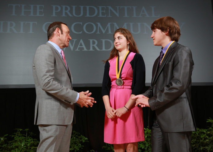 MARINA PALUMBO, center, and Cody Clarkin, right, local recipients of the Prudential Spirit of Community Awards, recently received personal recognition by actor Kevin Spacey, left, during an event in Washington, D.C.