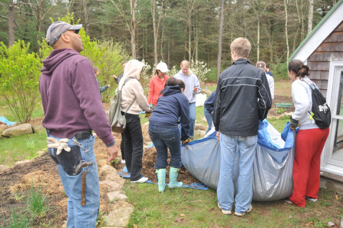 FOOD FOR THOUGHT: Students participate in a sustainability project on the gardens, or edible landscape, at The Apeiron Institute’s Center for Sustainable Living in Coventry. / COURTESY THE APEIRON INSTITUTE