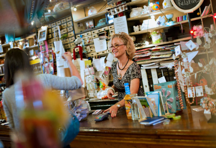 LAURA MASSAY smiles as she talks to a customer at Beetz Me in Princeton, Ill. Confidence among U.S. small businesses rose to a one-year high in May. / BLOOMBERG FILE PHOTO/DANIEL ACKER LAURA MASSAY smiles as she talks to a customer at Beetz Me in Princeton, Ill. Confidence among U.S. small businesses rose to a one-year high in May. / BLOOMBERG FILE PHOTO/DANIEL ACKER