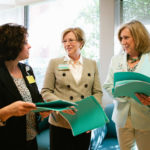 SPREADING THE CREDIT: Lifespan Senior Vice President of Financial Services and Care Management Ann M. Kashmanian, center, makes sure to share the kudos she receives for initiatives she has undertaken in numerous roles at Lifespan with colleagues, including Director of Clinical Documentation Karen DiMeglio, left, and Administrative Director Marybeth Almeida. / PBN PHOTO/RUPERT WHITELEY