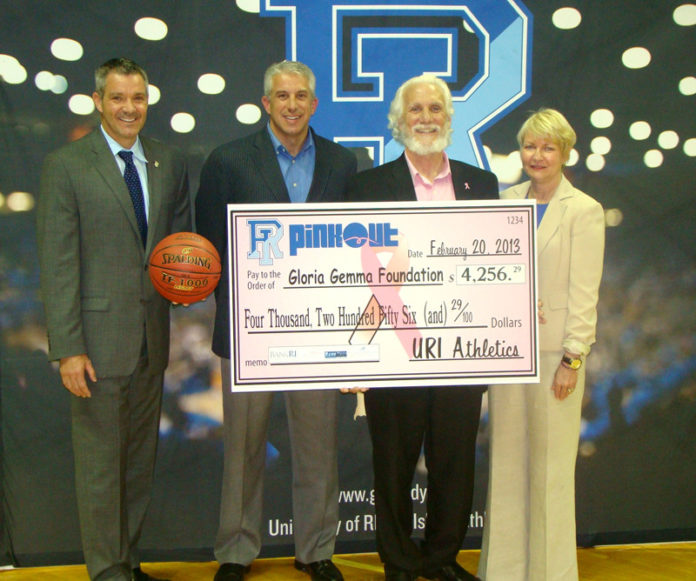 URI ATHLETICS, The Ryan Center, South County Hospital, BankRI and the Rams Zone recently presented a $4,256.29 donation to the Gloria Gemma Breast Cancer Resource Foundation. From left to right are Daryl Jasper of URI Athletics, Steven M. Parente of BankRI, Gary Calvino of  the Gloria Gemma Foundation and Susan Hall of South County Hospital.