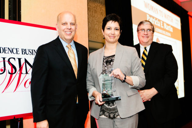 Woman to Watch Honoree Patricia Martin, Cox Communications accepts her award from Roger Bergenheim, PBN and Mark Meiklejohn, BankRI / Rupert Whiteley