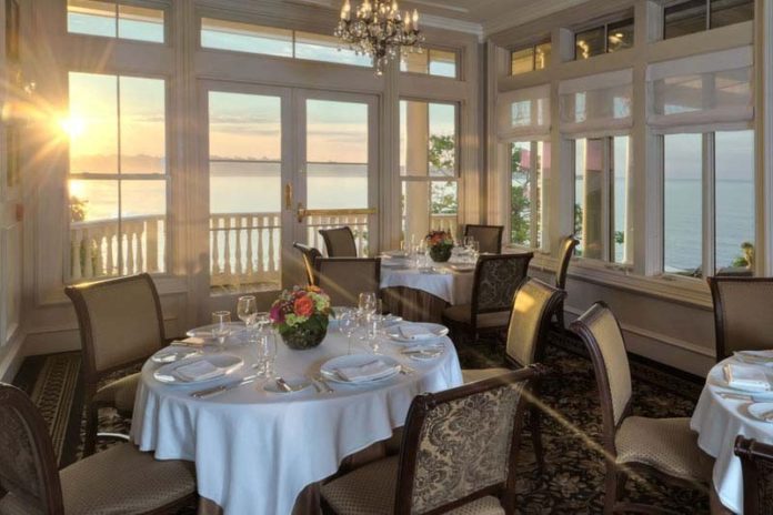 SPECTACULAR SCENERY: A view of the Atlantic Ocean as seen from the dining room of the Spiced Pear Restaurant at The Chanler. / COURTESY THE CHANLER